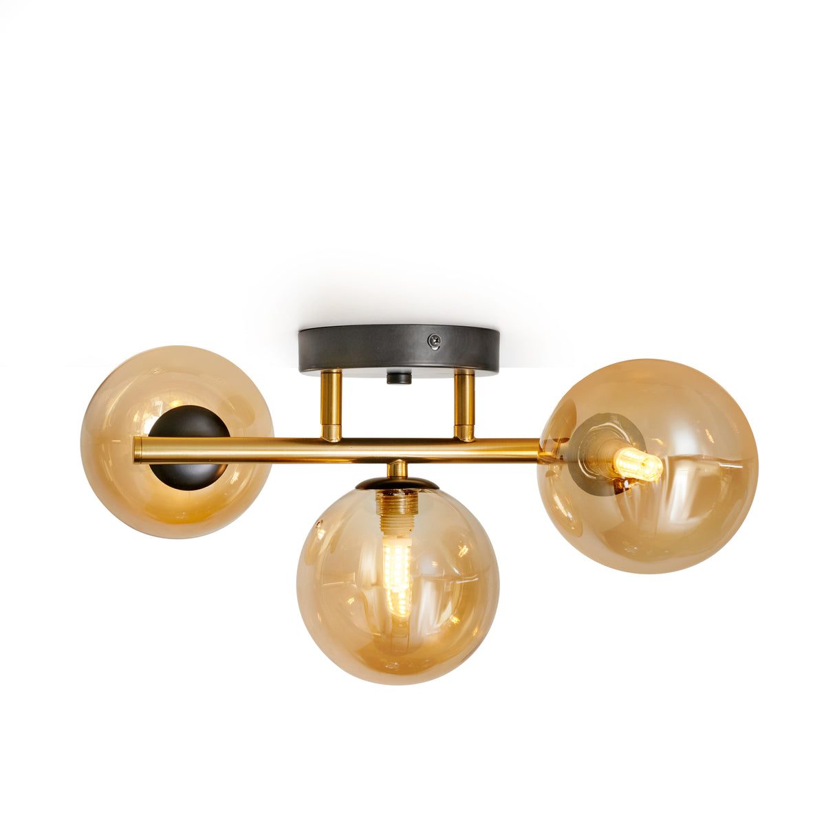 Goldene Deckenlampe mit 3 bernsteinfarbenen Glaskugeln