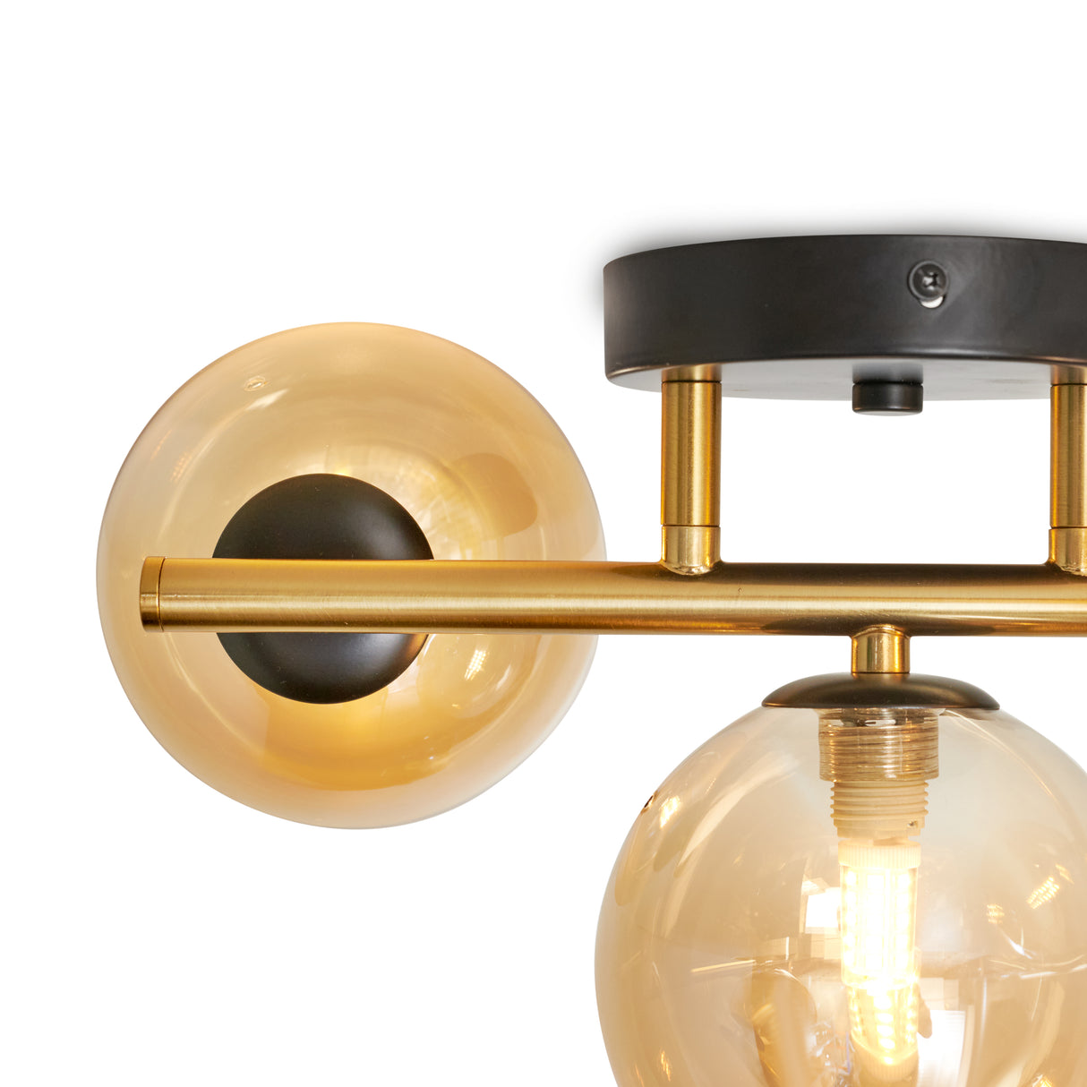 Goldene Deckenlampe mit 3 bernsteinfarbenen Glaskugeln